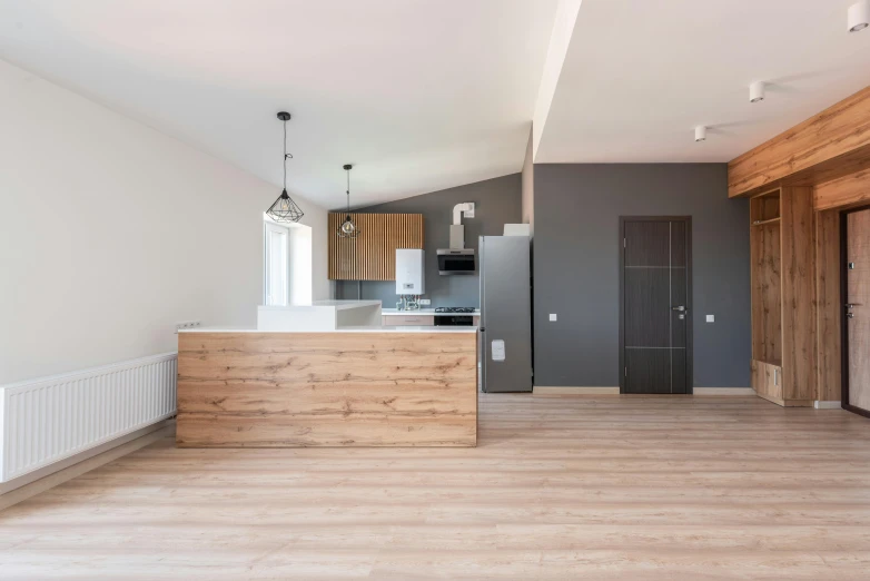 an empty living room with wood floors and white walls, a picture, by Adam Marczyński, trending on unsplash, kitchen, flat grey background, photo of a model, passive house