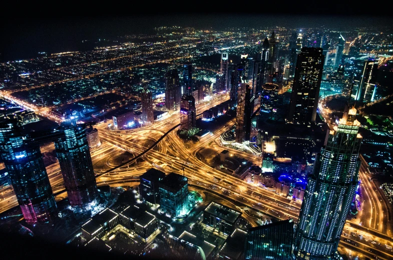 an aerial view of a city at night, pexels contest winner, dubai, photorealist, wide open city ”, fine art print