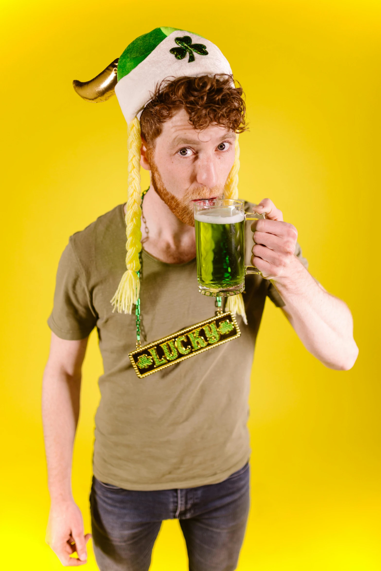 a man in a hat holding a glass of beer, inspired by Dicky Doyle, renaissance, green shirt, pudica pose, jackstraws, hr ginger