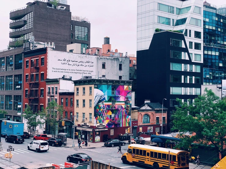 a city street filled with lots of traffic and tall buildings, a photo, street art, billboard image, multicolored, manhattan, middle eastern