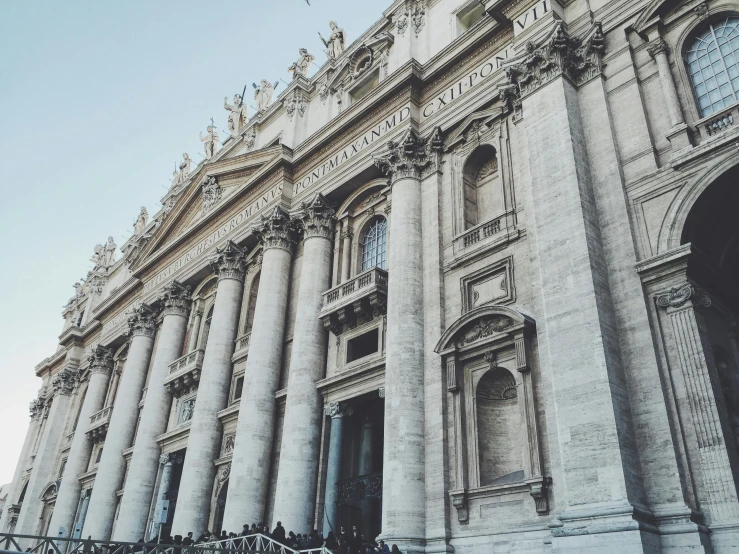 a group of people standing in front of a building, by Cagnaccio di San Pietro, pexels contest winner, neoclassicism, john paul ii, promo image, view from the ground, 🚿🗝📝