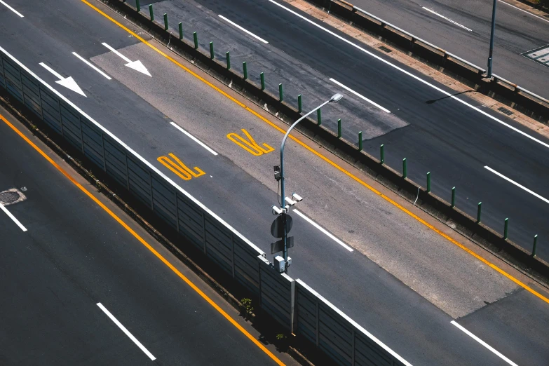 an overhead view of a highway with multiple lanes, pexels contest winner, postminimalism, street signs, guardrail, thumbnail, tel aviv street