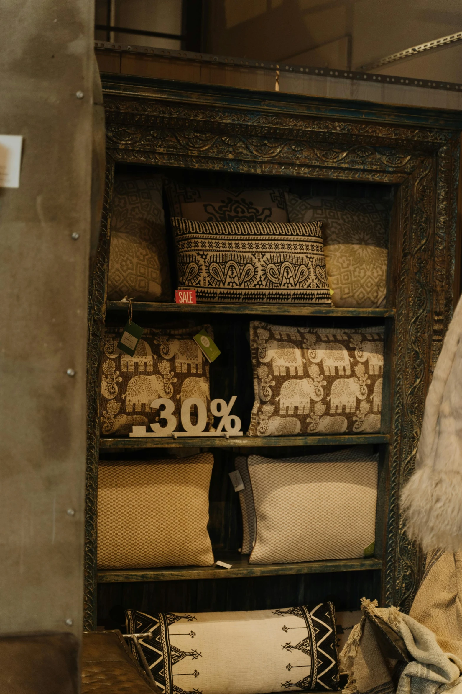 a teddy bear sitting on top of a chair in a room, sitting on a store shelf, intricate details in the frames, cushions, middle eastern details