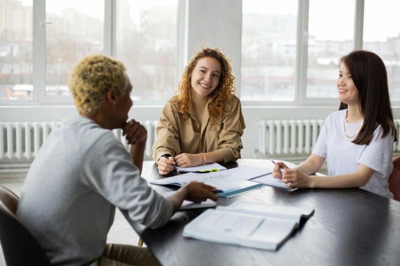 a group of people sitting around a table, on a desk, profile image, thumbnail, single subject