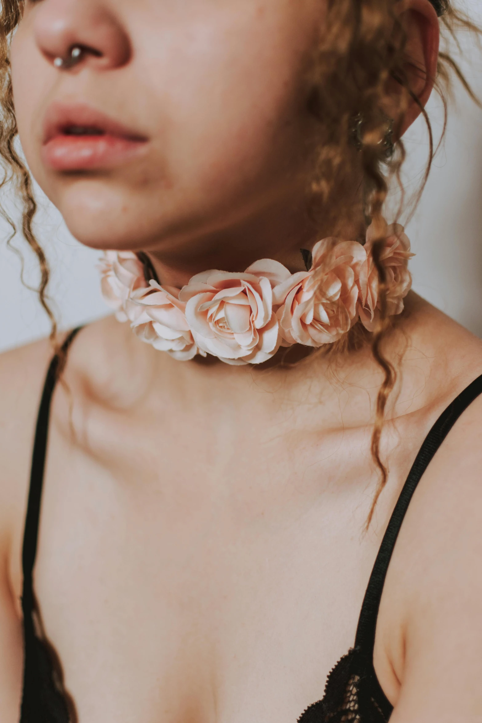 a close up of a woman wearing a bra, inspired by Elsa Bleda, unsplash, renaissance, crown of mechanical peach roses, choker necklace, made of silk paper, teenager