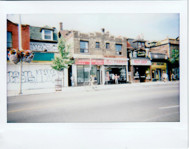 a couple of people walking down a street, a polaroid photo, ashcan school, house's and shops and buildings, boards of canada, very very aesthetic, from the distance