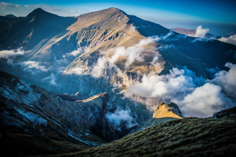 a view of the mountains from the top of a mountain, by Sebastian Spreng, pexels contest winner, figuration libre, vulcano, romanian, slide show, conde nast traveler photo