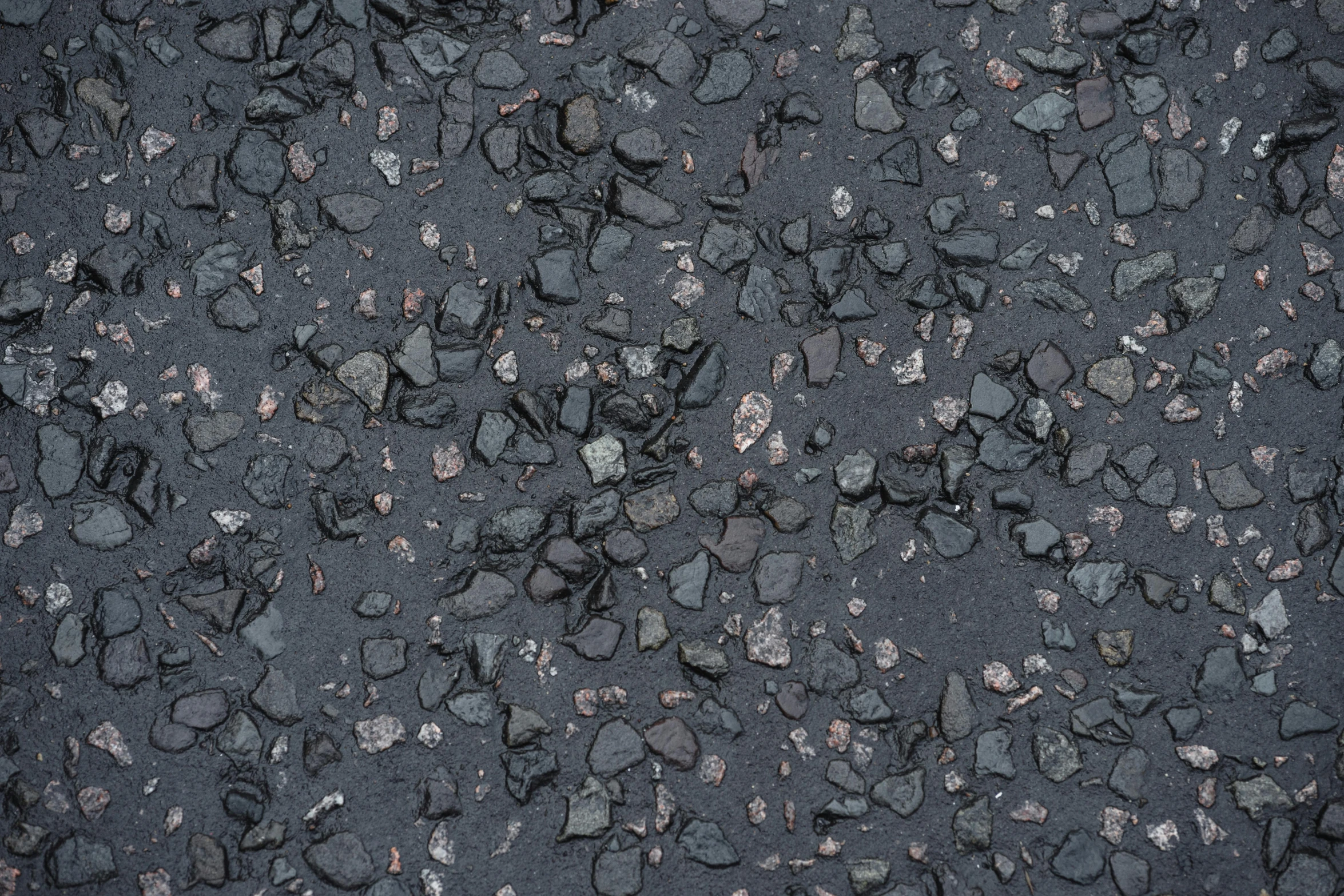 a close up of rocks and gravel on the ground, an album cover, by Jan Kupecký, polycount, conceptual art, very asphalt, panel of black, roofing tiles texture, 16k upscaled image