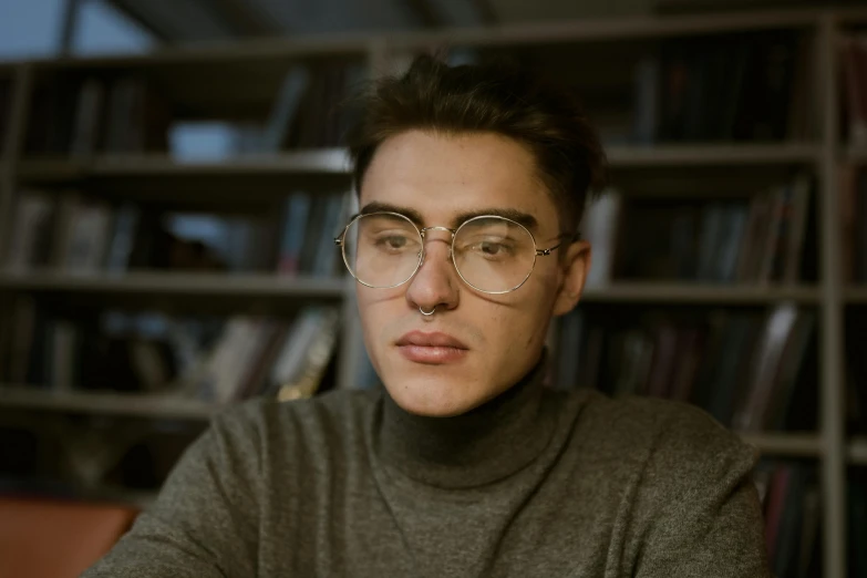 a close up of a person wearing glasses, a character portrait, inspired by Ion Andreescu, trending on pexels, handsome male, wearing turtleneck, librarian, 90s photo