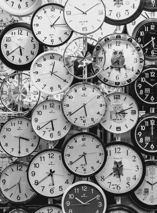 a black and white photo of a bunch of clocks, by Matija Jama, 256x256, trending, background image, taken on iphone 14 pro