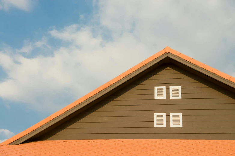 a close up of a roof with a sky background, by Carey Morris, trending on pexels, orange line, square, brown, side profile shot