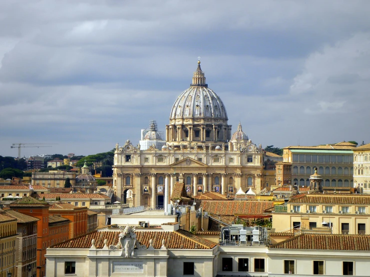 a large building with a dome on top of it, inspired by Cagnaccio di San Pietro, pexels contest winner, neoclassicism, vista view, square, john paul ii, brown