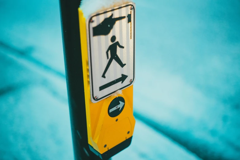 a close up of a street sign on a pole, a cartoon, trending on pexels, walking on ice, yellow light, 🚿🗝📝, pictogram