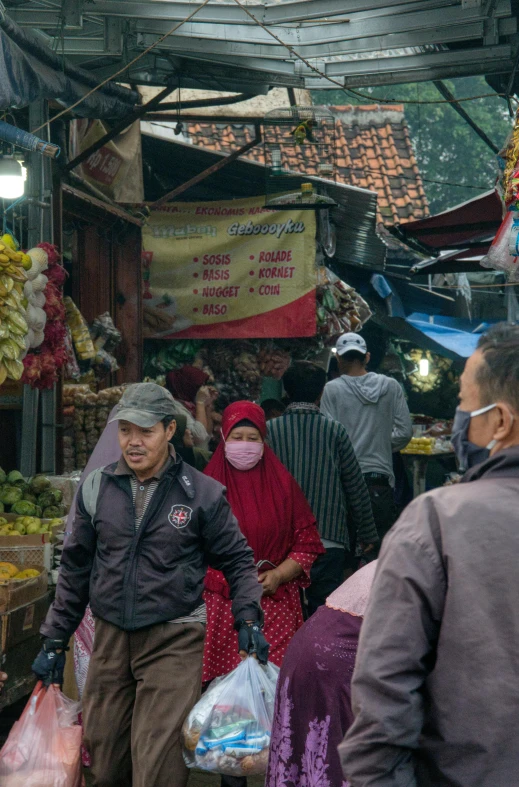 a group of people walking through a market, jakarta, balaclava covering face, split near the left, maroon