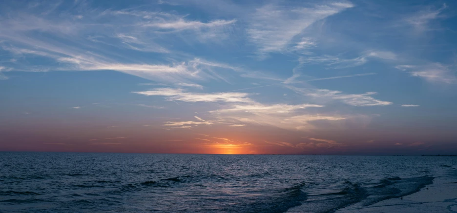 the sun is setting over the ocean on the beach, unsplash contest winner, romanticism, orange and blue sky, 2022 photograph, evening sky, from wheaton illinois