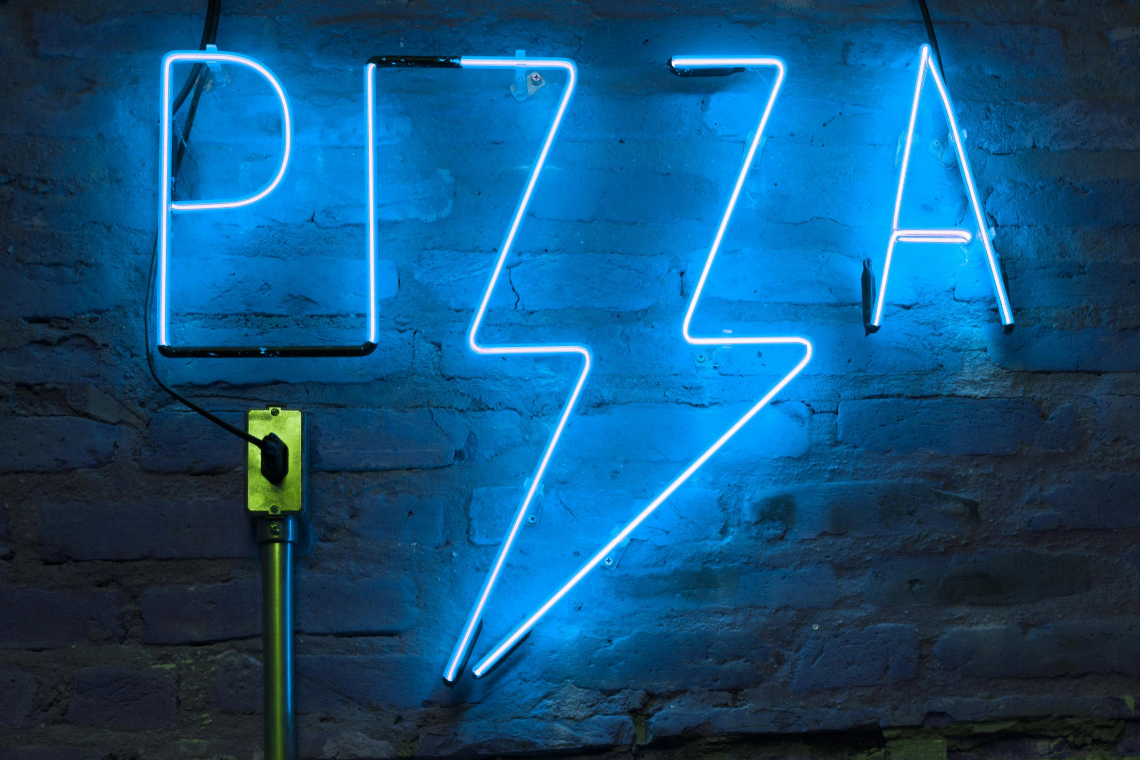 a neon sign that says pizza on a brick wall, by Julia Pishtar, pexels, crackling blue lightning, thunder storm, neon standup bar, infused with lightning