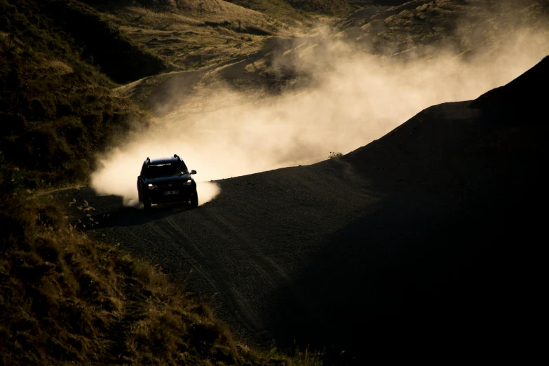 a car that is driving on a dirt road, by Daniel Seghers, black sand, avatar image, profile image, octane 8