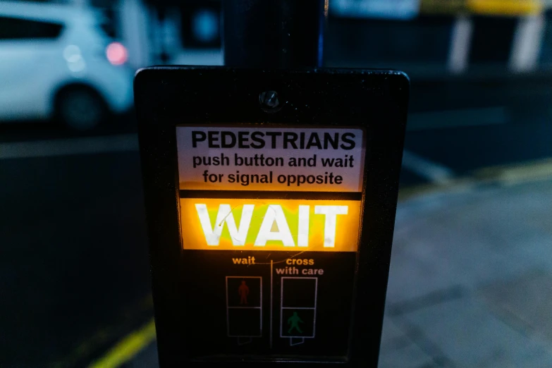 a close up of a parking meter on a city street, by Matt Stewart, unsplash, yellow lights, square, crossing road, hivis