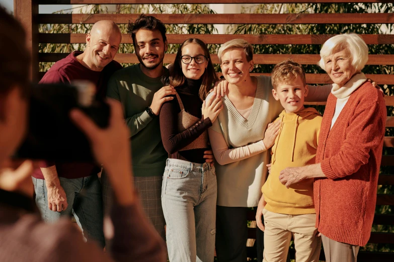 a group of people standing next to each other, a picture, pexels contest winner, happy family, avatar image, instagram post, ad image