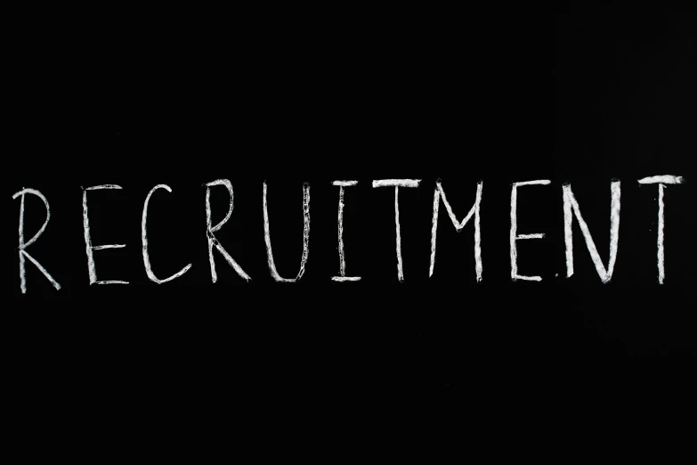 the word recruitment written in white chalk on a blackboard, pexels, with a black background, background image, animation, 0
