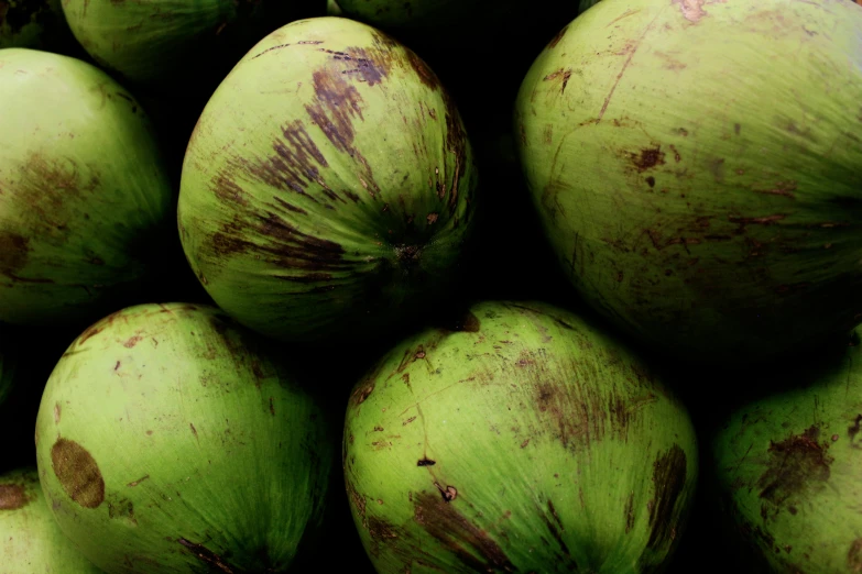a pile of green apples sitting on top of each other, a digital rendering, unsplash, hurufiyya, coconuts, thumbnail, vietnam, multiple stories