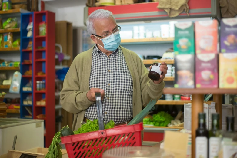 a man wearing a face mask in a grocery store, a picture, old man doing with mask, avatar image, no cropping, rené laloux