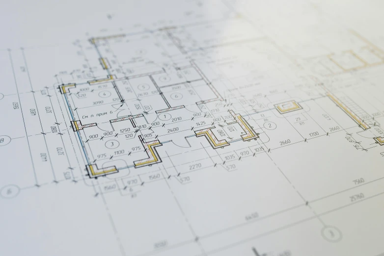 a drawing of a house sitting on top of a table, a detailed drawing, floor plan, a close up shot, subtle detailing, commercial photo