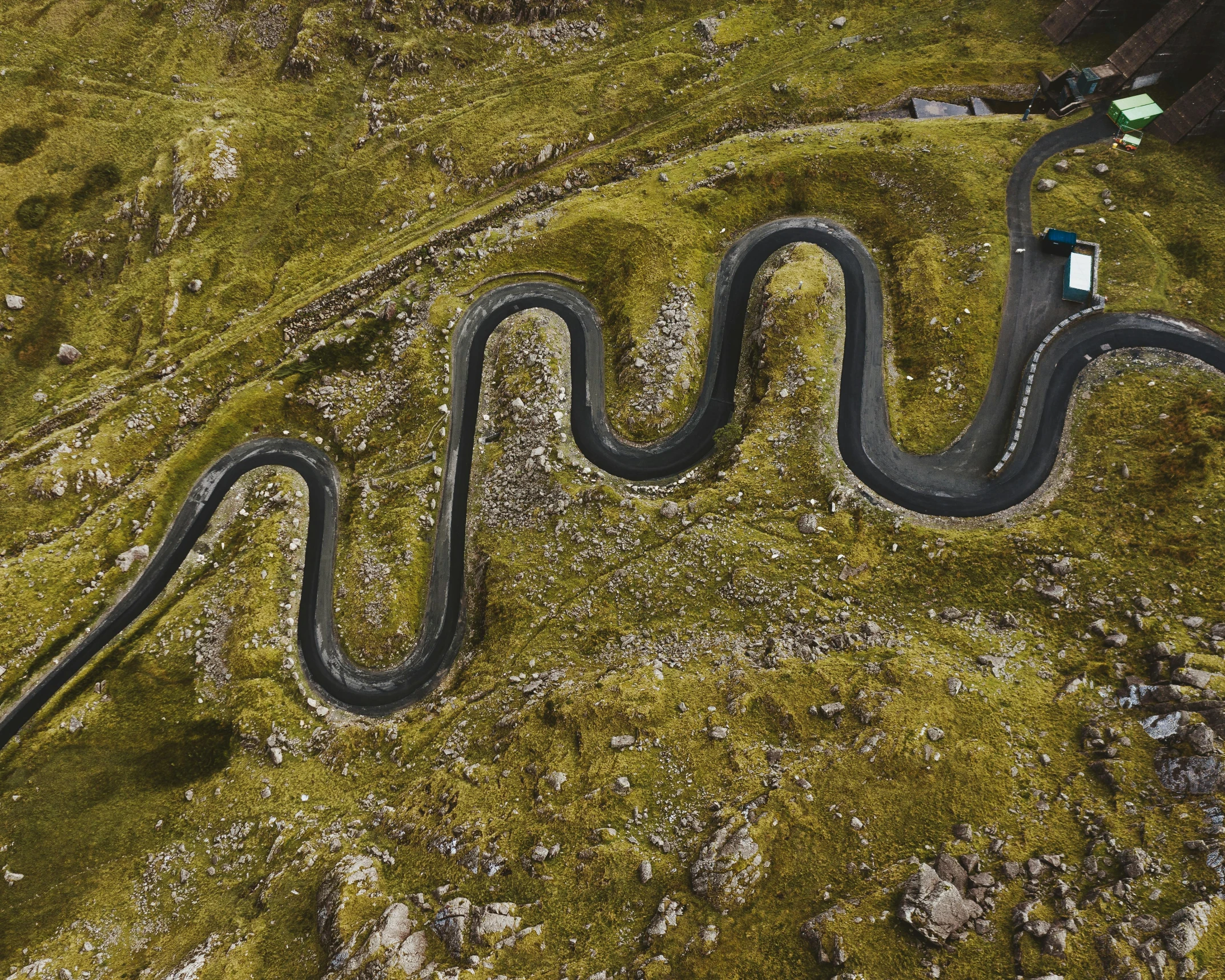 an aerial view of a winding mountain road, by Daniel Lieske, pexels contest winner, art nouveau, loch ness monster, video still, avatar image