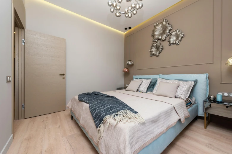 a bed room with a neatly made bed and a chandelier, a 3D render, by Adam Marczyński, pexels contest winner, beige, white and teal metallic accents, inside a cozy apartment, thumbnail