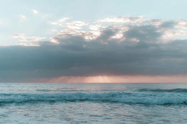 the sun is shining through the clouds over the ocean, inspired by Elsa Bleda, unsplash contest winner, minimalism, pastel blues and pinks, gold coast australia, 8k resolution”, clean 4 k