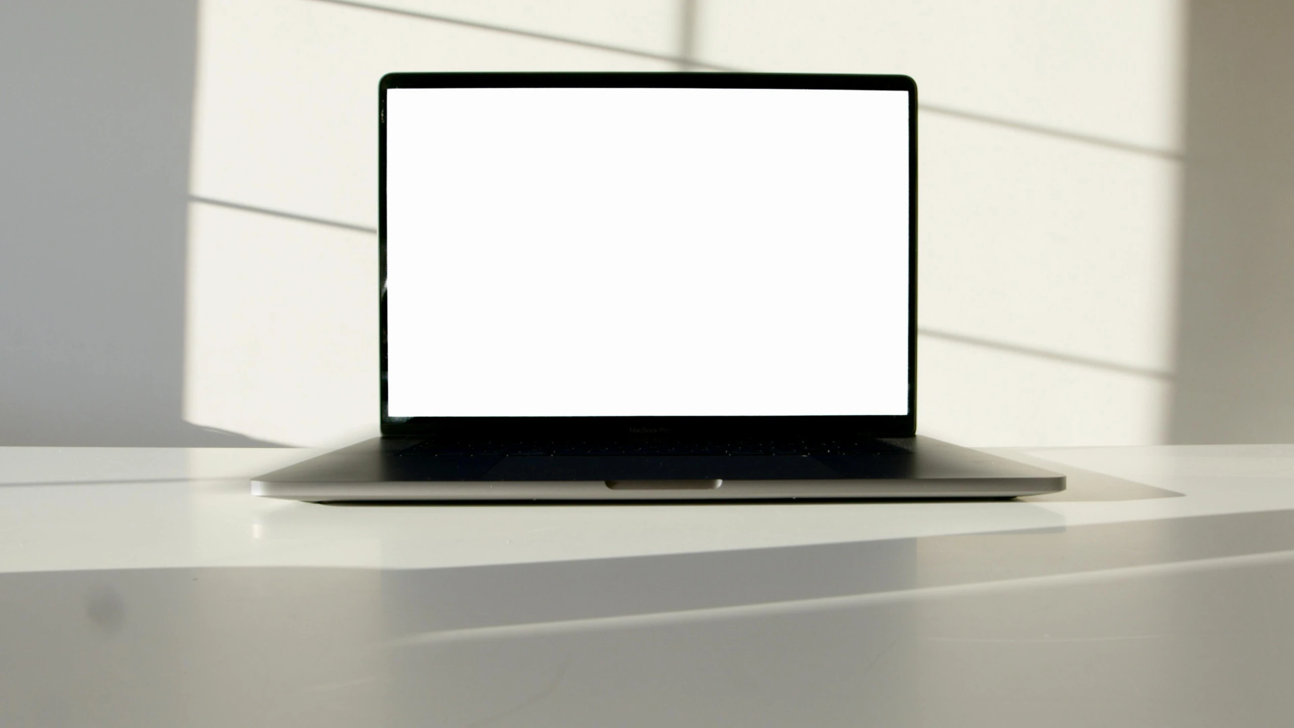 a laptop computer sitting on top of a white table, a computer rendering, pexels, natural lighting. 8 k, 4 0 9 6, glowing screen, thumbnail