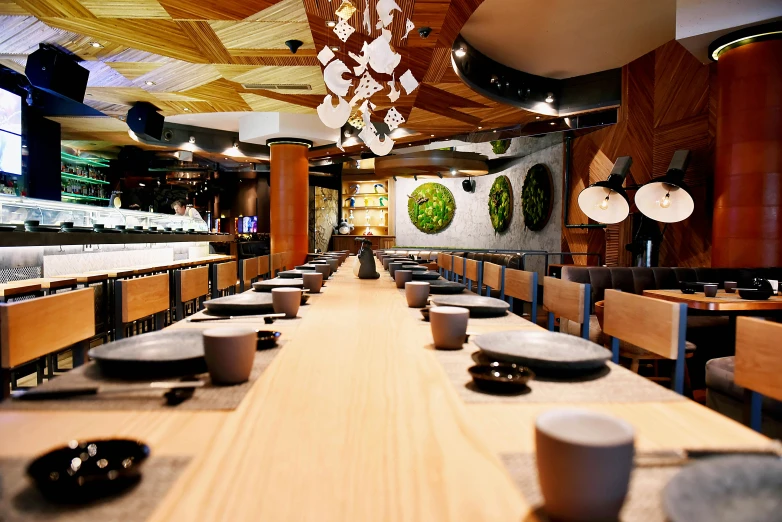 a dining room filled with lots of wooden tables, inspired by Nishida Shun'ei, unsplash, mingei, chefs table, wide angle”, “ iron bark, 2 0 0 0's photo