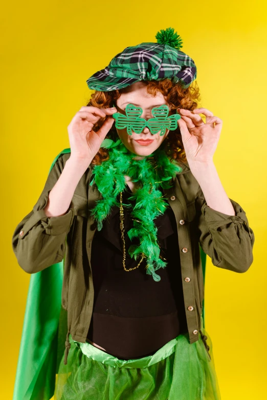 a woman dressed up as a st patrick's day costume, a portrait, trending on pexels, finn wolfhard, photo booth, superhero, college