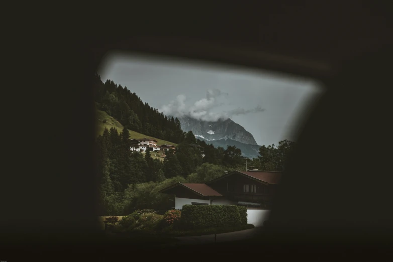 a view of the mountains through a window, by Tobias Stimmer, visual art, car shot, hasselblad photograph, view of villages, 4k shot