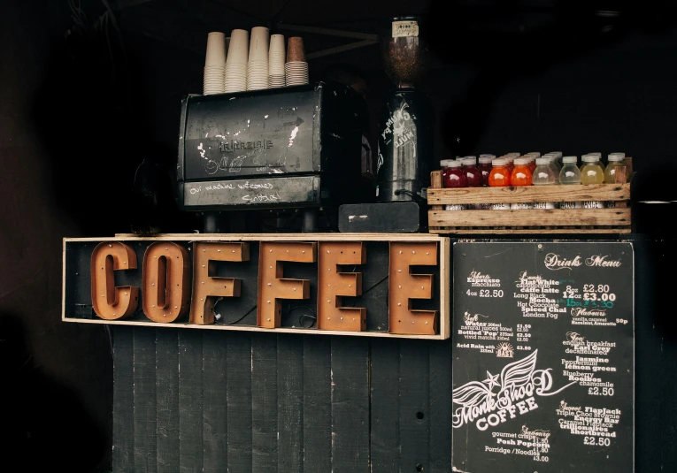 a black and white photo of a coffee shop, pexels contest winner, black and brown colors, shack close up, background image, bright signage