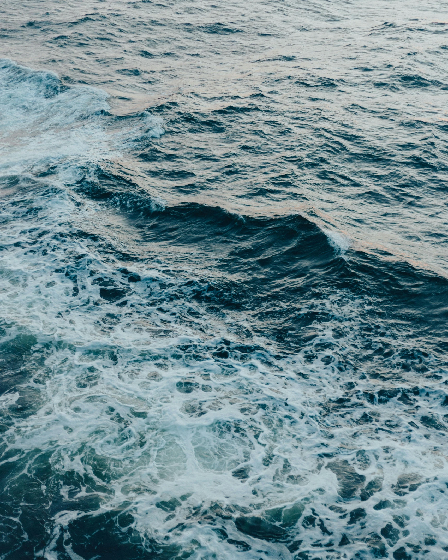 a view of the ocean from the top of a boat, an album cover, trending on unsplash, turbulent water, ignant, lo fi, rippling muscles