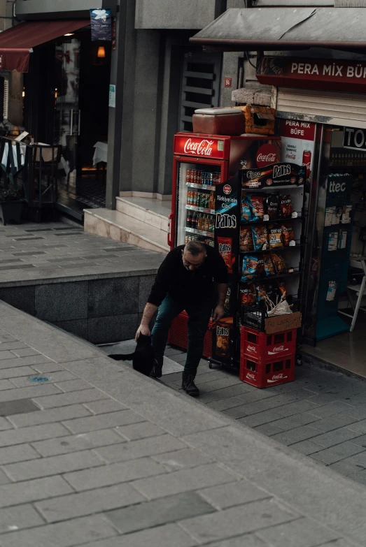 a man riding a skateboard down the side of a street, pexels contest winner, happening, vending machine, steps leading down, part dean cornwell style, merchant stands