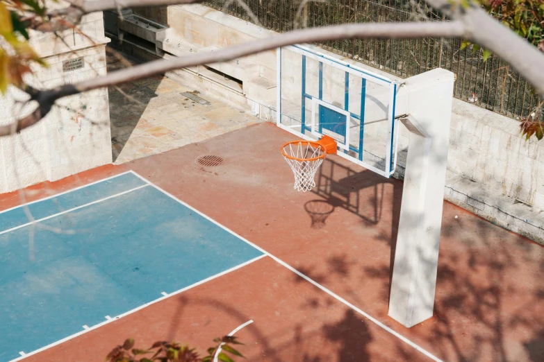 an overhead view of a basketball court with a basketball hoop, by Matija Jama, unsplash contest winner, realism, cyprus, school courtyard, off - white collection, 15081959 21121991 01012000 4k