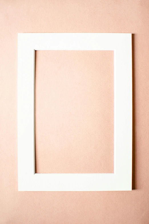 a white frame sitting on top of a pink wall, unsplash, paper grain, 15081959 21121991 01012000 4k, square shapes, pale orange colors