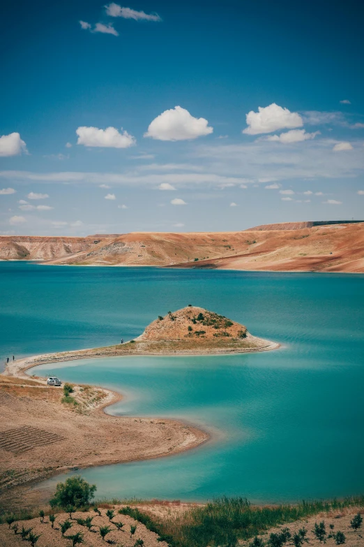 a large body of water sitting in the middle of a desert, by Muggur, lake blue, southern slav features, 5 0 0 px, mining