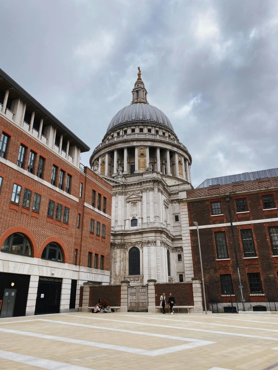 the dome of st paul's cathedral in london, a photo, by Christopher Wren, unsplash, academic art, seen from outside, 2 0 0 4 photograph, profile image, other smaller buildings