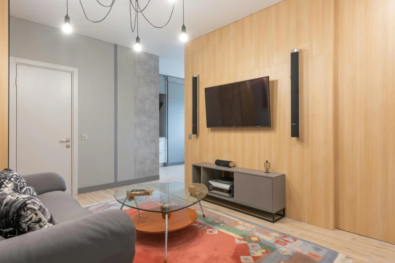 a living room filled with furniture and a flat screen tv, by Alexander Fedosav, unsplash contest winner, light and space, neo kyiv, cables on walls, gray and orange colours, interior wood