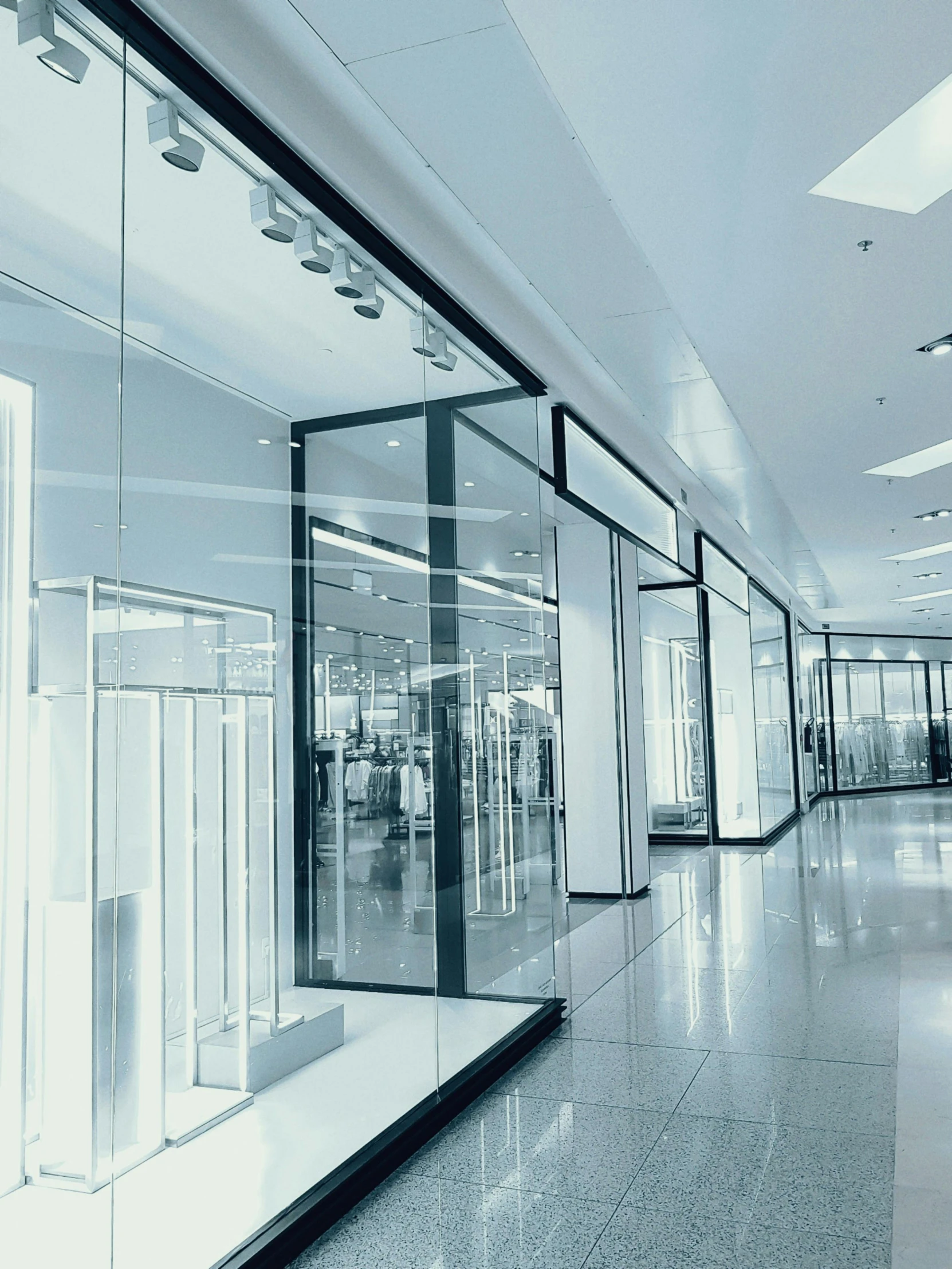 a store filled with lots of glass doors, unsplash, modernism, high fashion expensive, thumbnail, white gallery, led
