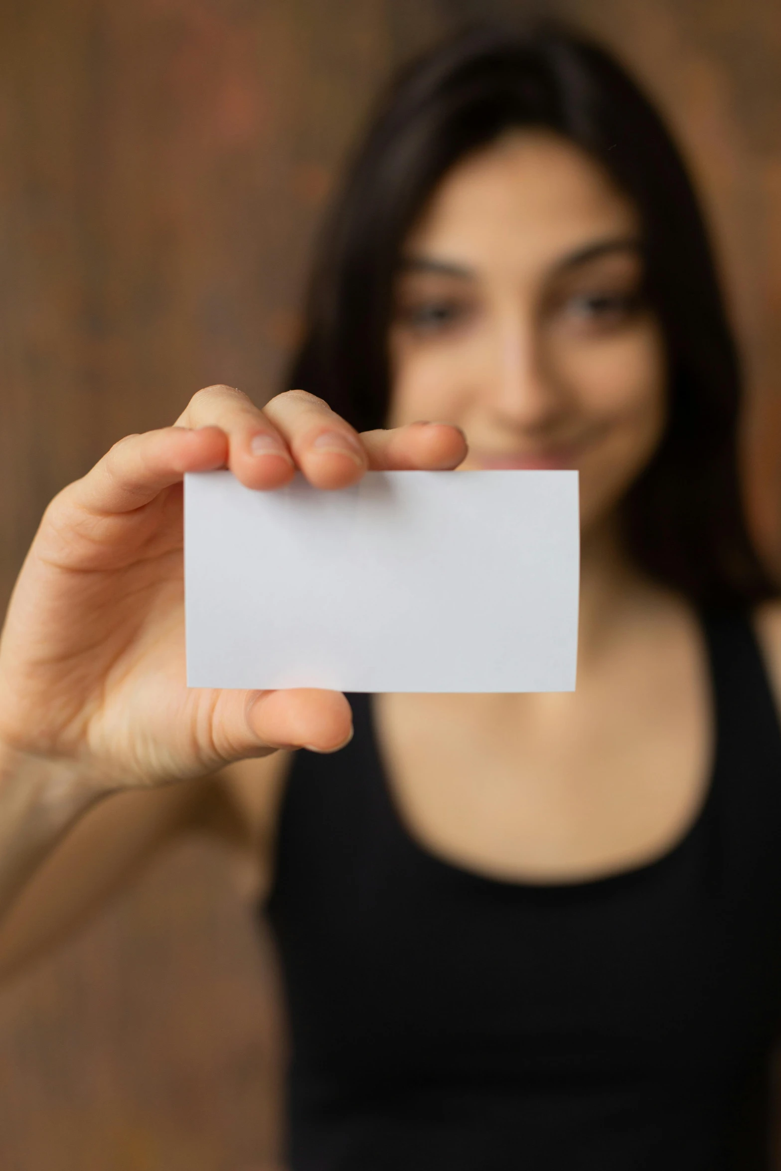 a woman holding a business card in front of her face, pexels, square, made of lab tissue, no - text no - logo, teenage girl