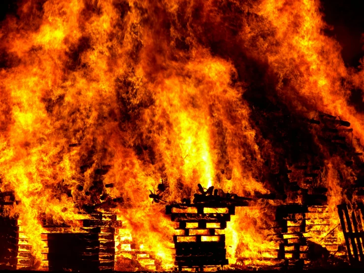 a fire burning inside of a wooden structure, pixabay, huge explosions everywhere, avatar image, demolition, background image