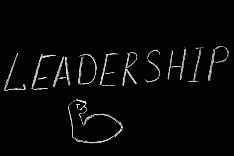 a blackboard with the words leadership written on it, a black and white photo, pixabay, cartoon image, sheath, leader, featured