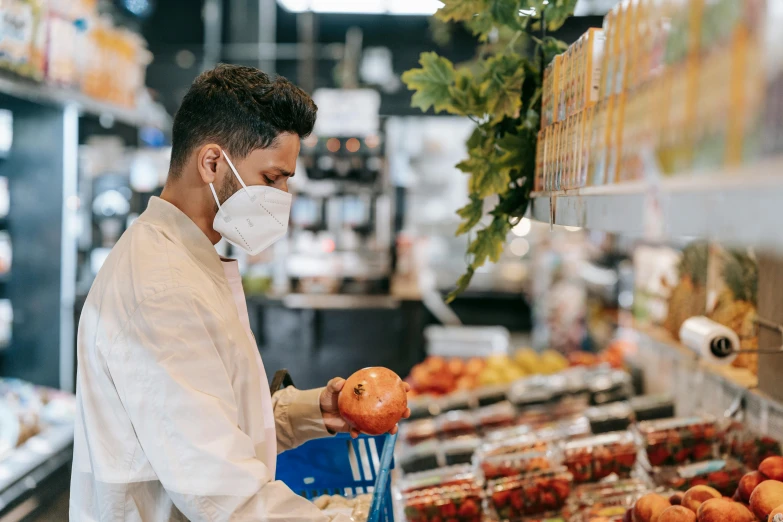 a man wearing a face mask in a grocery store, pexels contest winner, manuka, 2 5 6 x 2 5 6 pixels, sentient fruit, city views