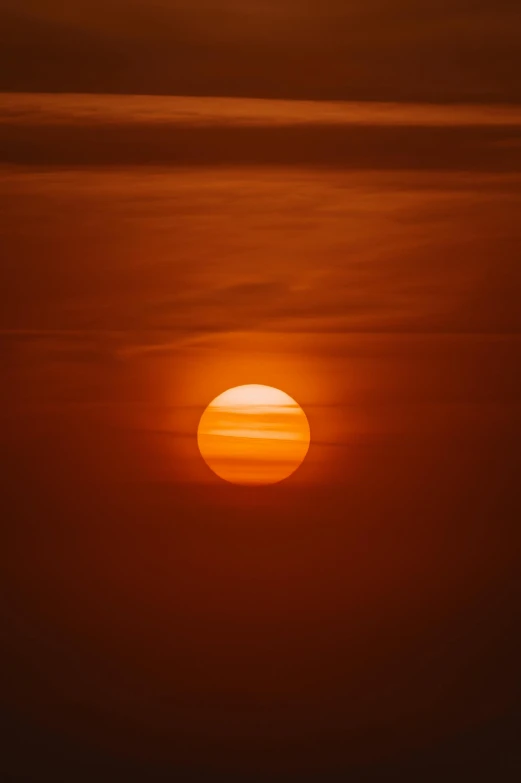 the sun is setting over a body of water, pexels, digital yellow red sun, slide show, may 1 0, orange fog