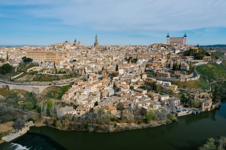 an aerial view of the city of toledo, spain, pexels contest winner, baroque, brown, hyper realistic, 2022 photograph, print