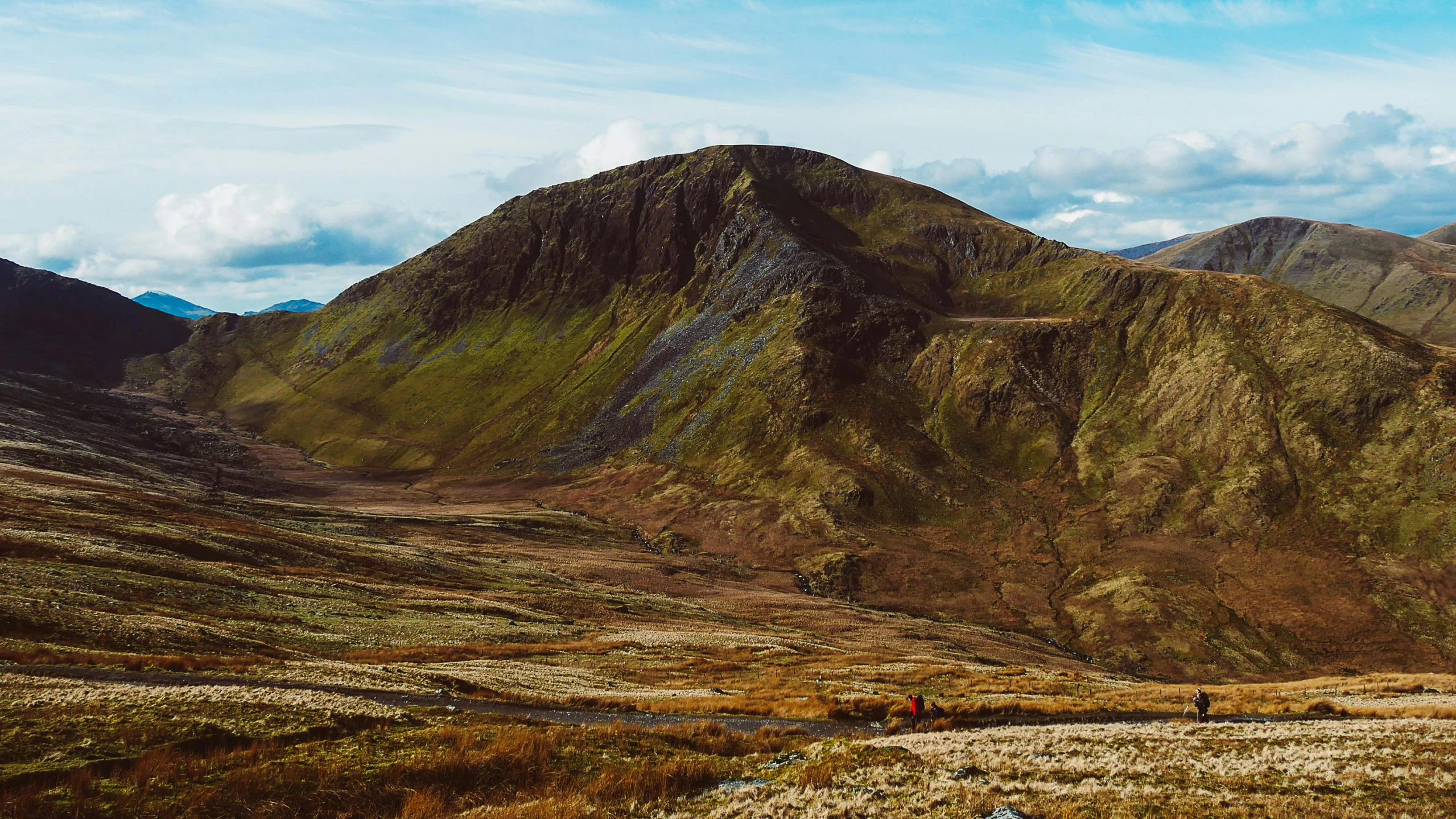 a group of people walking up the side of a mountain, by Julia Pishtar, pexels contest winner, hurufiyya, irish mountains background, thumbnail, flattened, panorama